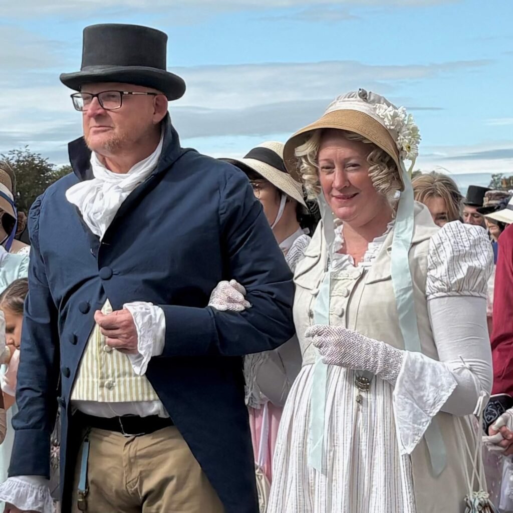 Participants showcasing Regency fashion during the Costume Parade in Bath