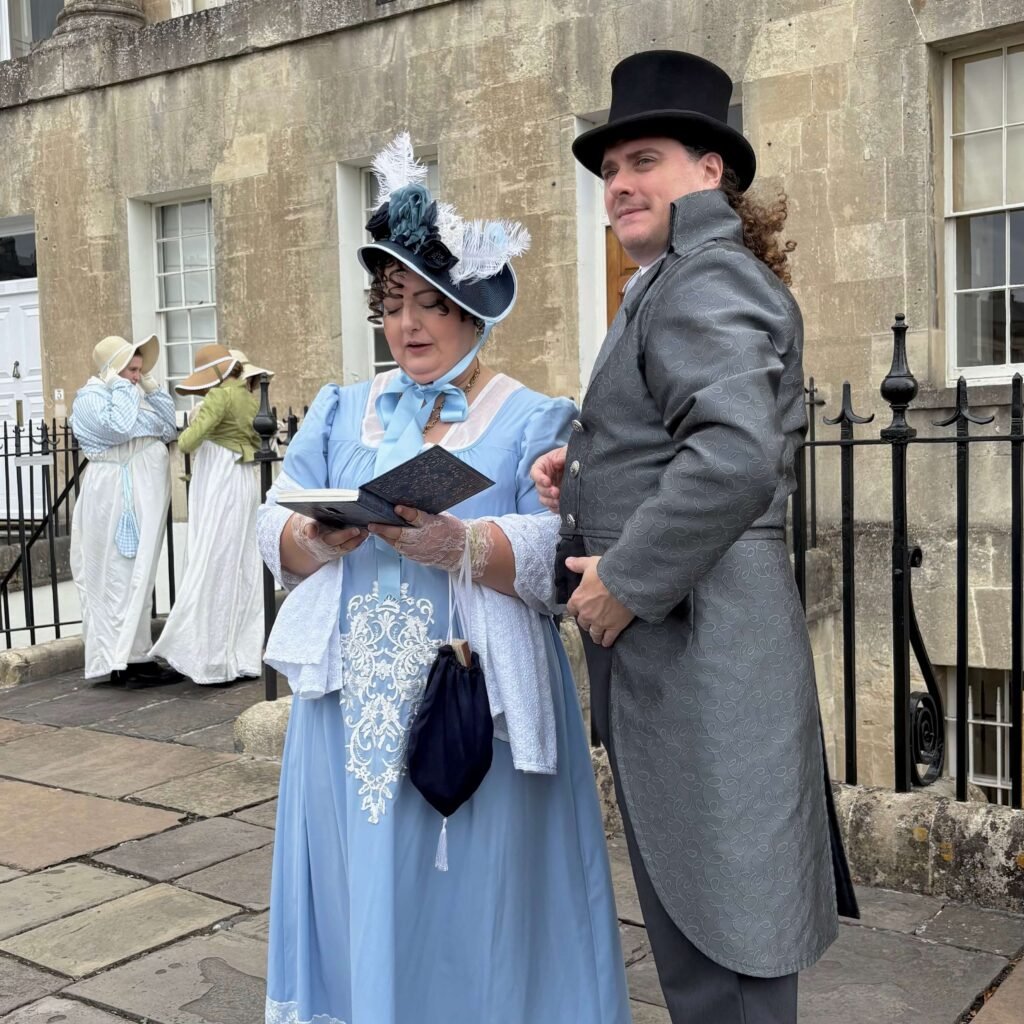 Festival participants in period costumes near Bath’s Royal Crescent