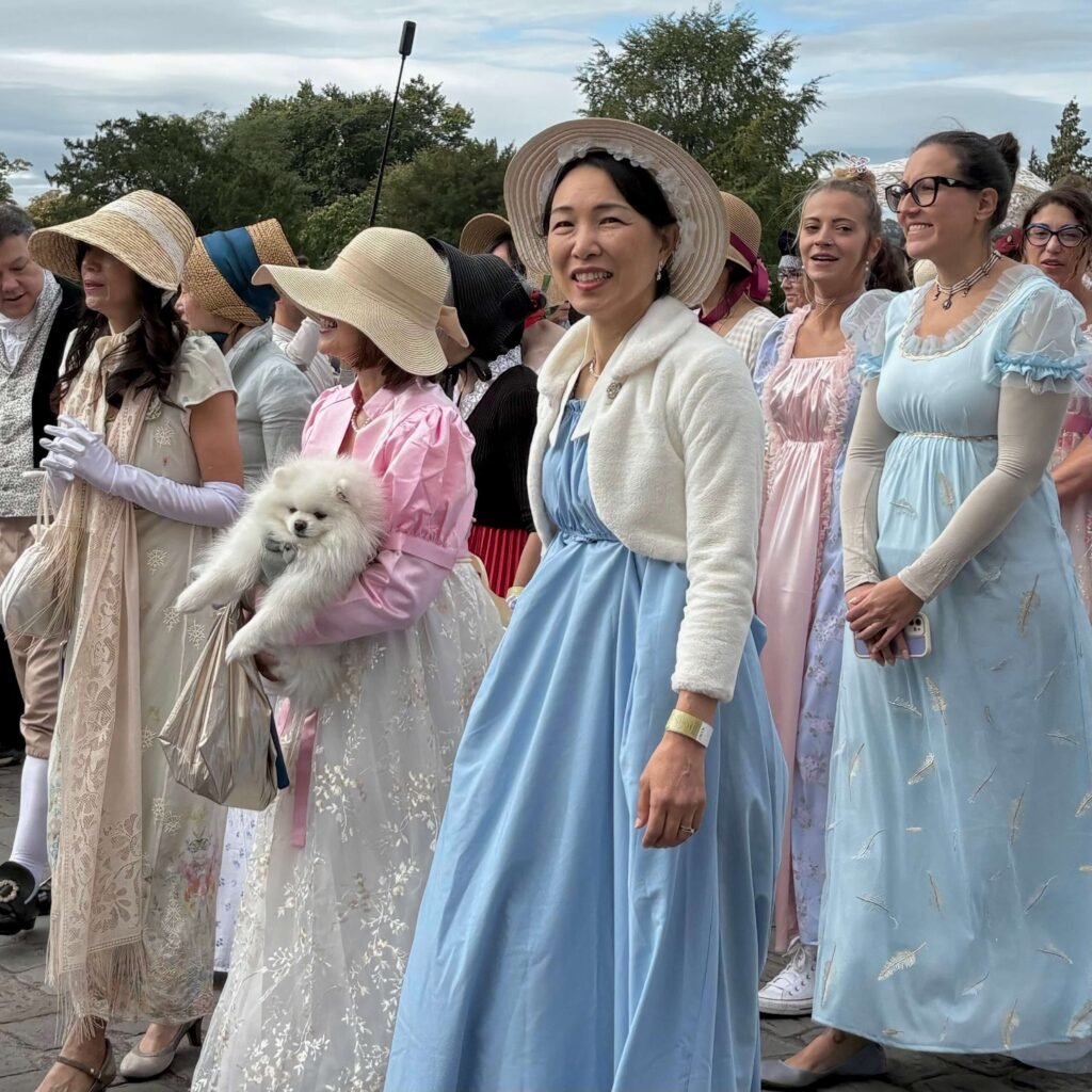 Participants in period costumes at the Grand Regency Costumed Promenade in Bath
