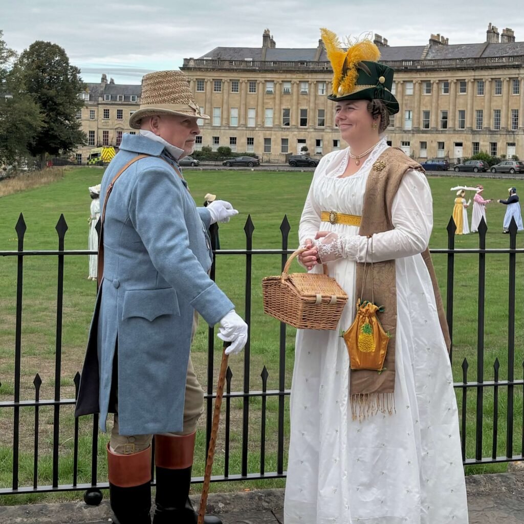 Couple dressed in Regency costumes near the Royal Crescent in Bath