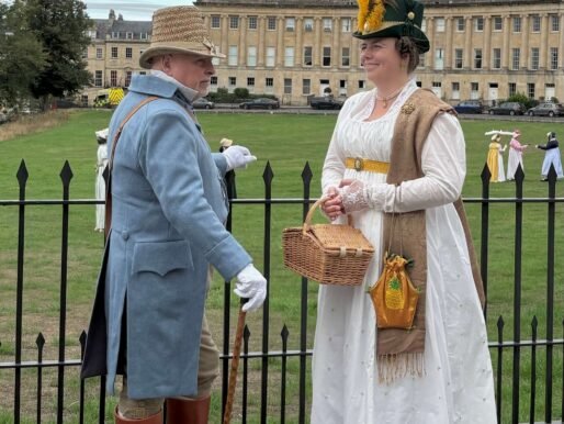 Couple dressed in Regency costumes near the Royal Crescent in Bath